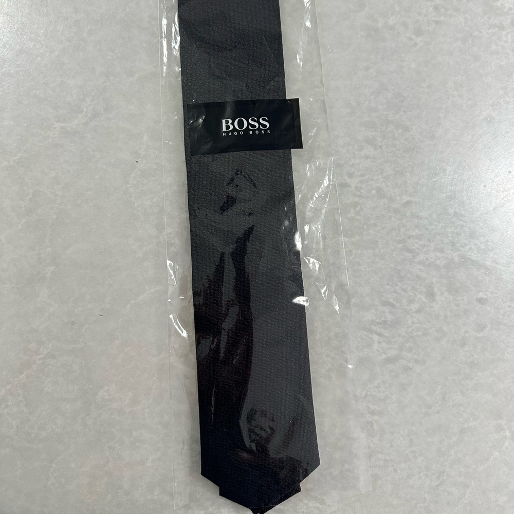 Black on black textured Hugo Boss tie